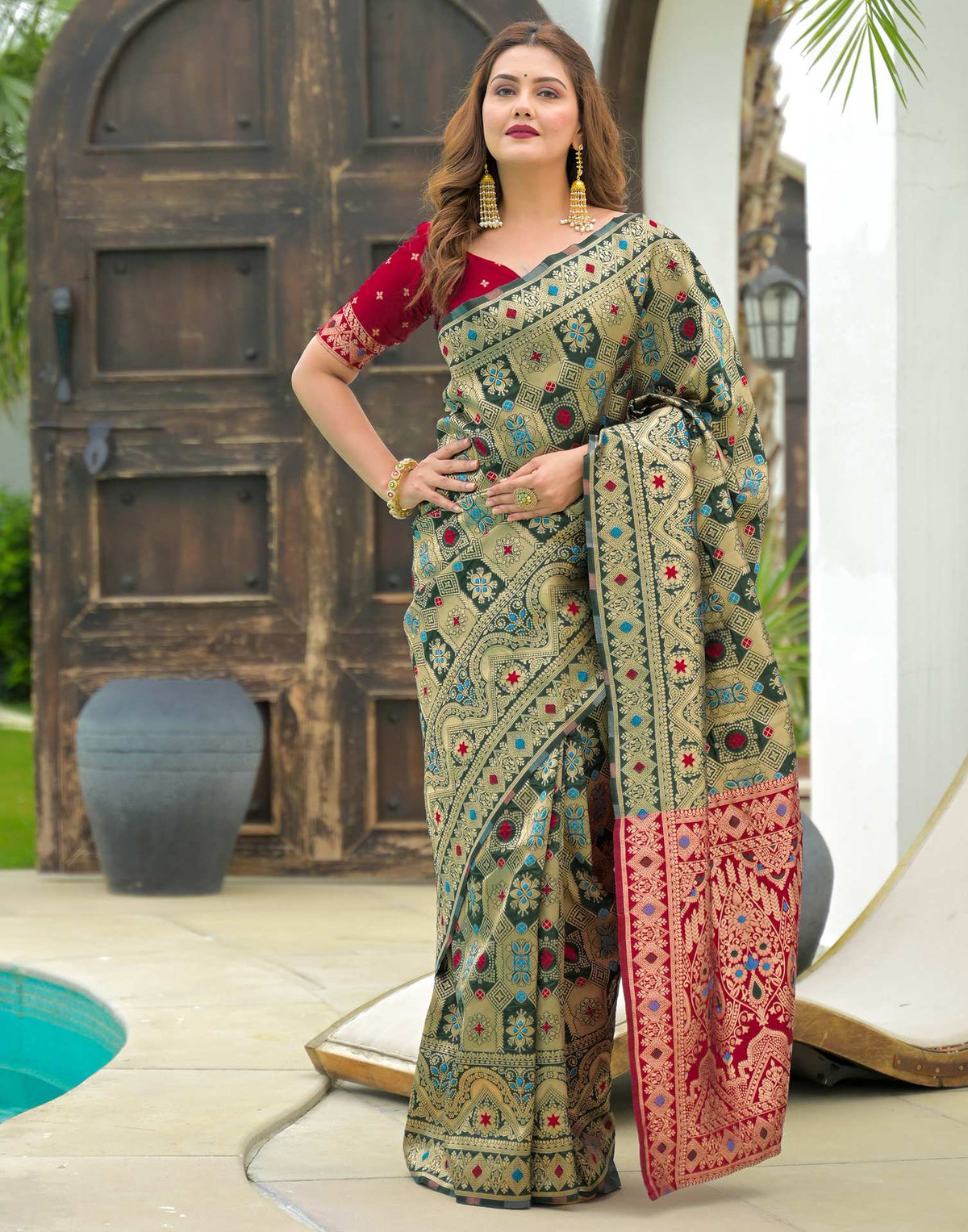 Green Charmi Banarasi Silk Woven Saree