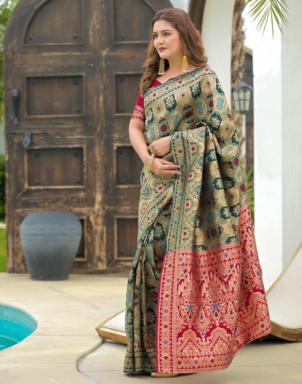 Green Charmi Banarasi Silk Woven Saree