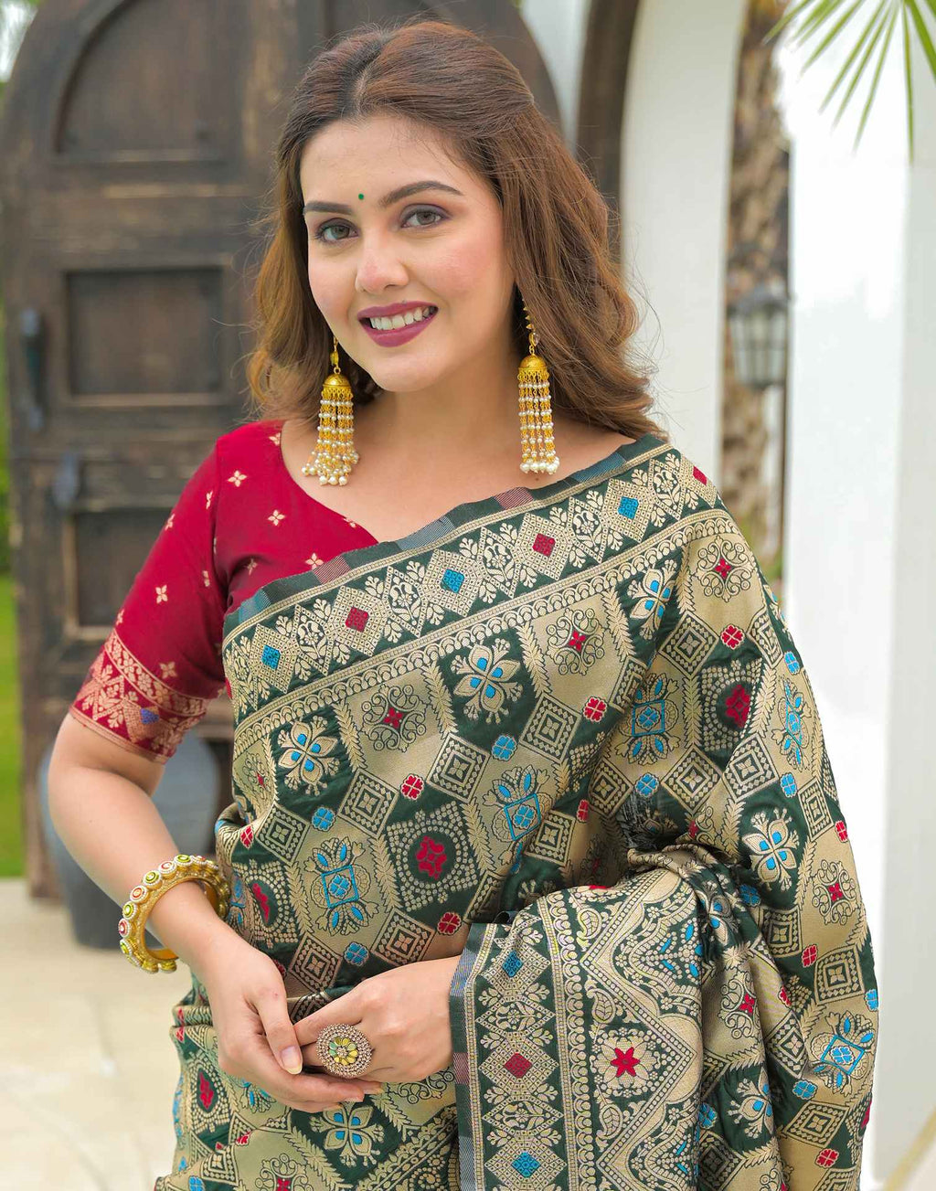 Green Charmi Banarasi Silk Woven Saree