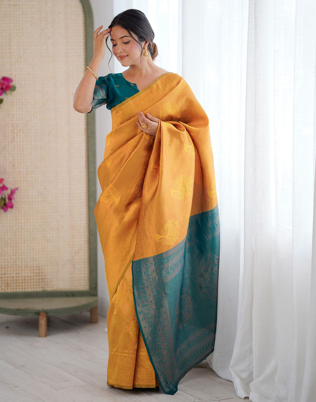 Yellow Charmi Silk Woven Saree