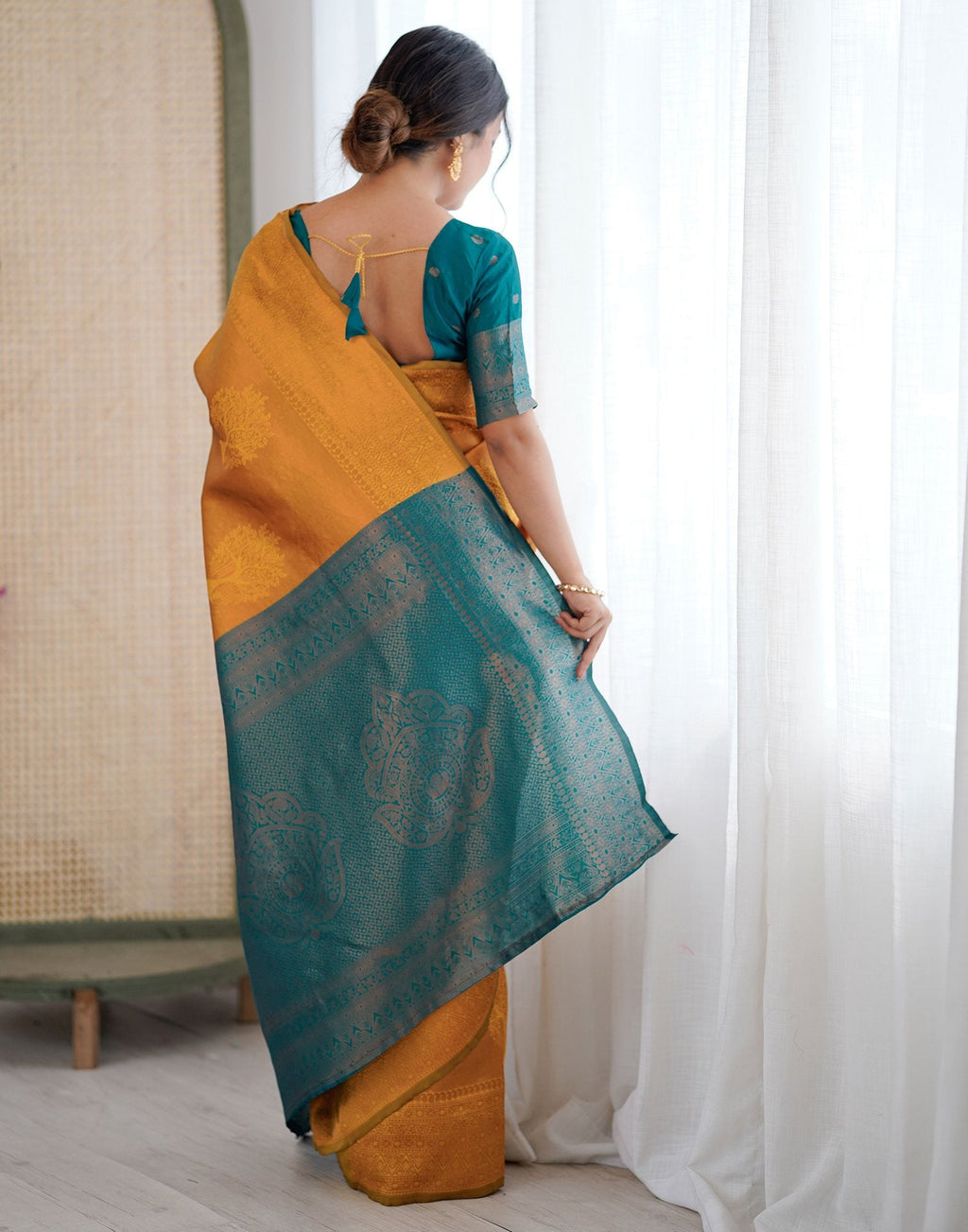 Yellow Charmi Silk Woven Saree