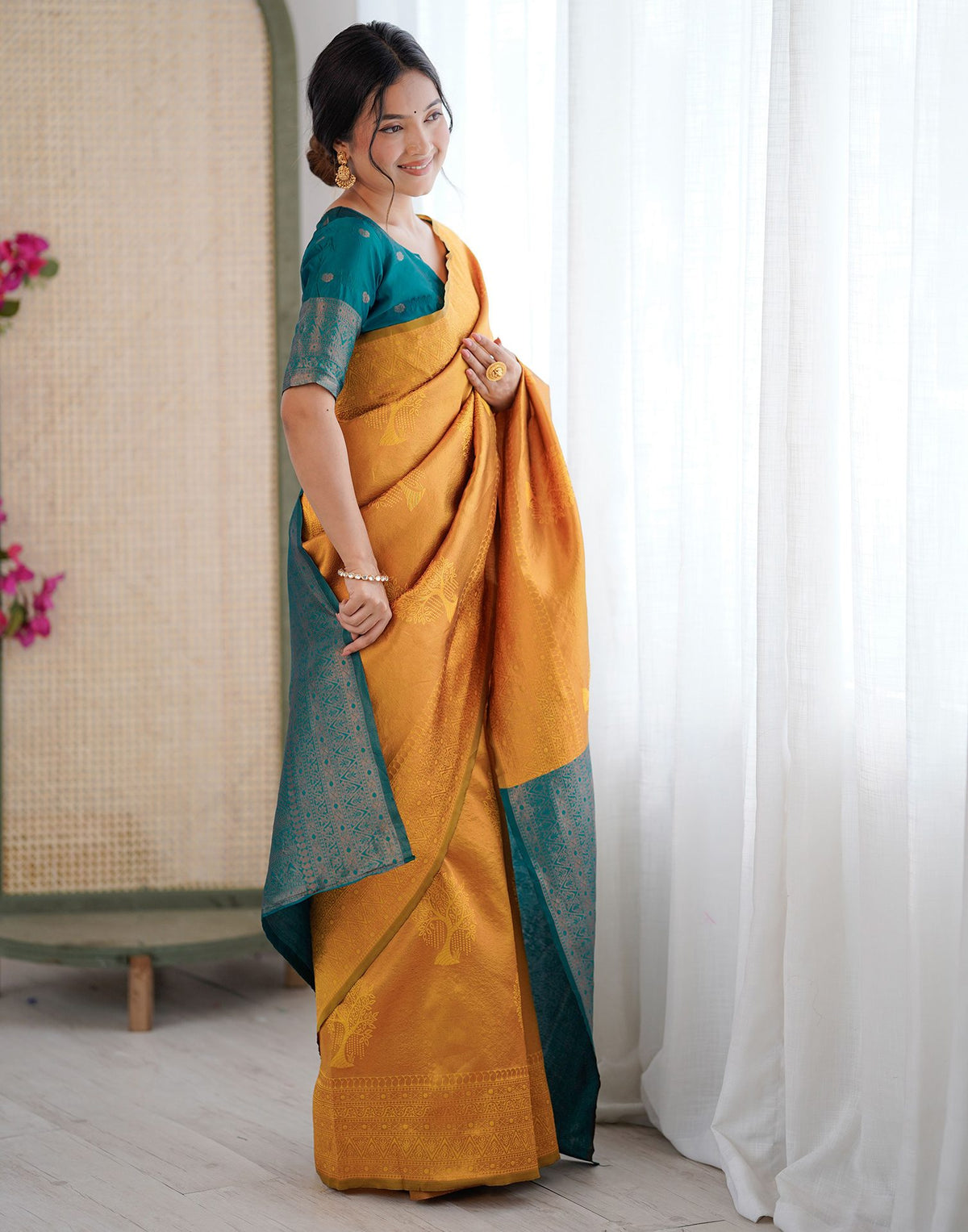 Yellow Charmi Silk Woven Saree