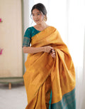 Yellow Charmi Silk Woven Saree