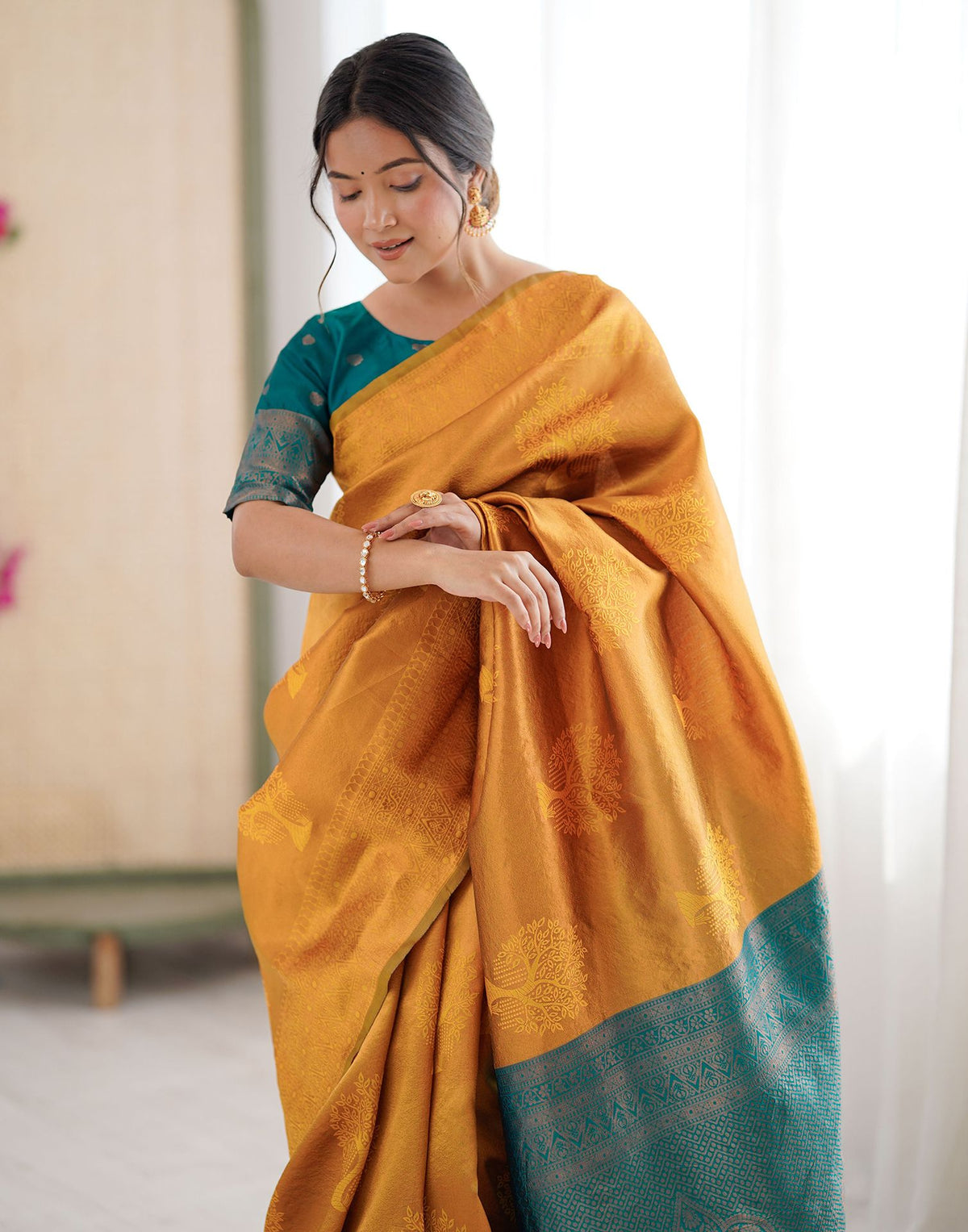 Yellow Charmi Silk Woven Saree